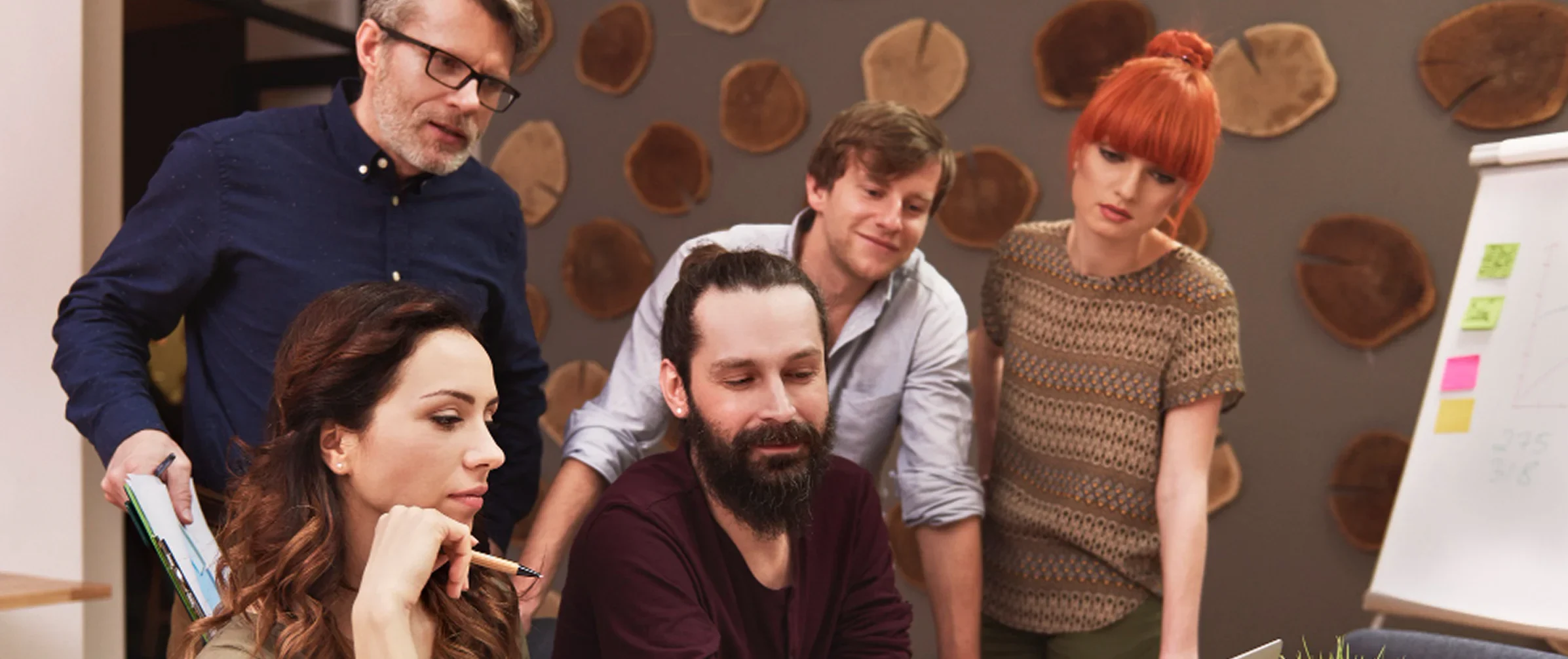Five colleagues working together.